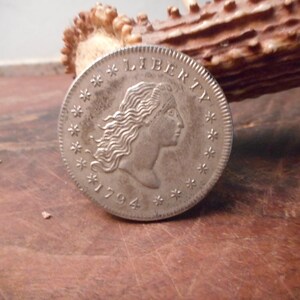 First Design Bust Dollar