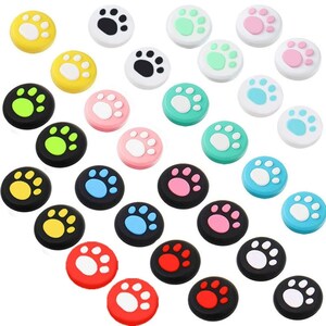 Empuñaduras para pulgar con forma de pata en color negro y rosa, agarre para Joy-Con para Nintendo Switch 2, juego de agarres de silicona con tapas, un juego de cuatro piezas (Joy-Con no incluidos) imagen 7