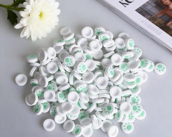 Empuñaduras para pulgar en forma de pata blancas y verdes, agarre para Joy-Con para Nintendo Switch 2, juego de agarre de silicona con tapas, un juego de cuatro piezas (Joy-Con no incluidos)