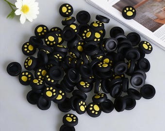 Empuñaduras para pulgar con forma de pata de color amarillo y negro, tapas de joystick, bonito juego de agarre de silicona, un juego de cuatro piezas (Joycons no incluidos)