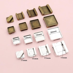 May include: Assortment of square metal tray settings in various sizes, including 10mm, 11mm, 12mm, 15mm, and 20mm. The trays are made of silver and gold metal.