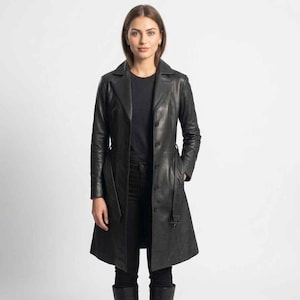 May include: A set of three ceramic mugs with a speckled, matte finish. The mugs are in shades of cream, light gray, and dark gray. Each mug has a simple, minimalist design, perfect for coffee or tea.