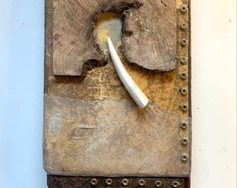 Serene collage with natural materials in neutrals, tactile, warm vibe