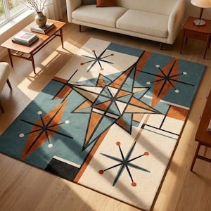 Op de afbeelding: Een rechthoekig vloerkleed met een geometrisch patroon in mid-century stijl, voorzien van een groot centraal stermotief. Het ontwerp bevat tinten blauwgroen, gebrand oranje, crème en zwart, aangevuld met kleinere steraccenten en lijnen.