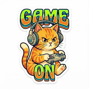May include: A sticker featuring an orange tabby cat wearing headphones and holding a video game controller. The words "GAME ON" are written above and below the cat in a colourful, outlined font. The cat has an angry expression.