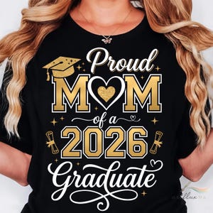 May include: Black t-shirt with gold text reading "Proud MOM of a 2026 Graduate." The design features a graduation cap, heart, and scroll illustrations. A thoughtful gift for a proud mother.
