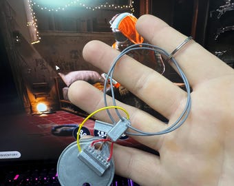 Decoración de escritorio estilo carroñero con llave de escotilla de los ARC Raiders