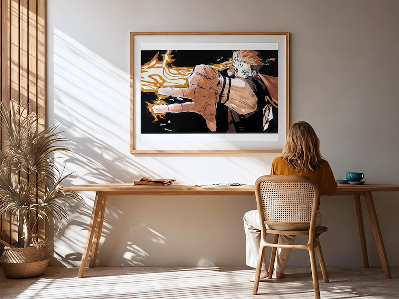 Pode incluir: Uma impress&atilde;o art&iacute;stica emoldurada com uma ilustra&ccedil;&atilde;o detalhada de um personagem com energia flamejante emanando de sua m&atilde;o. A obra de arte &eacute; definida contra um fundo preto e emoldurada em madeira clara. A cena &eacute; em uma sala com uma mesa e cadeira de madeira.