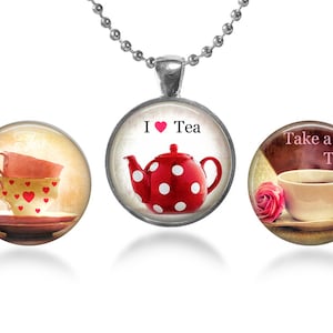 May include: Three round glass pendants with silver chains. The pendants feature vintage-style images of teacups, a teapot, and a cup of tea with the text "Take a Tea".