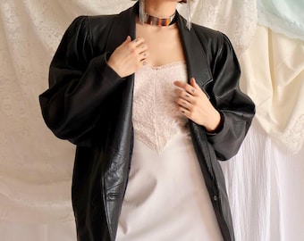 Vintage 1980s oversize black Cassidy Leather Fashions jacket | Size M
