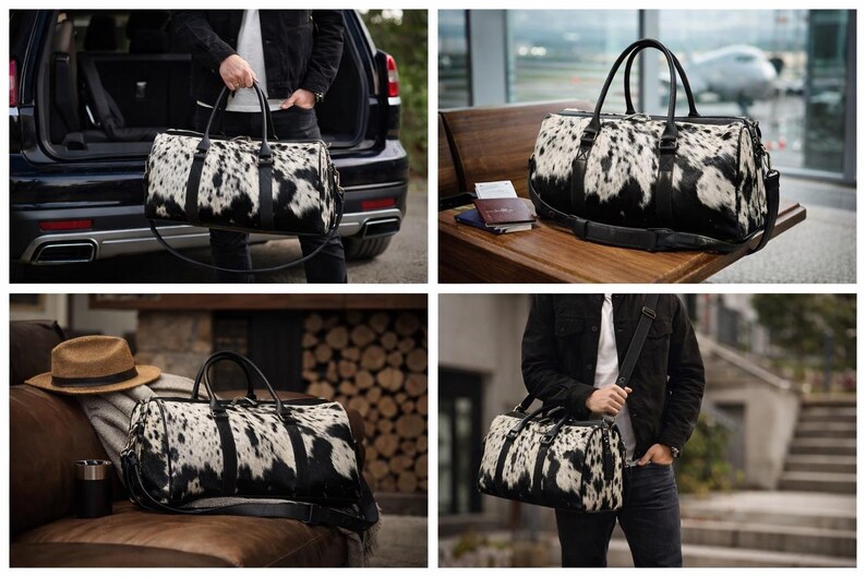 May include: A duffel bag featuring a black and white cowhide pattern with black leather handles, a detachable shoulder strap, and a top zipper closure. The bag has a cylindrical shape with reinforced black leather trim and metal hardware.