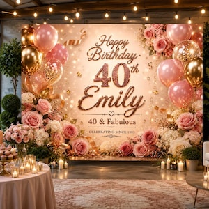 May include: A birthday backdrop featuring rose gold and pink balloons, clusters of pink and white roses, and the text Happy Birthday 40th Emily 40 & Fabulous Celebrating Since 1985. The design includes shimmering gold accents and soft lighting.