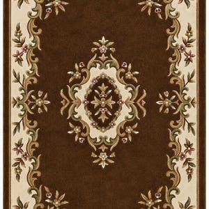 May include: A rectangular area rug featuring a deep brown central field with a central floral medallion. The border is cream-colored with intricate scrolling acanthus leaf patterns, floral motifs in muted green, pink, and tan tones.