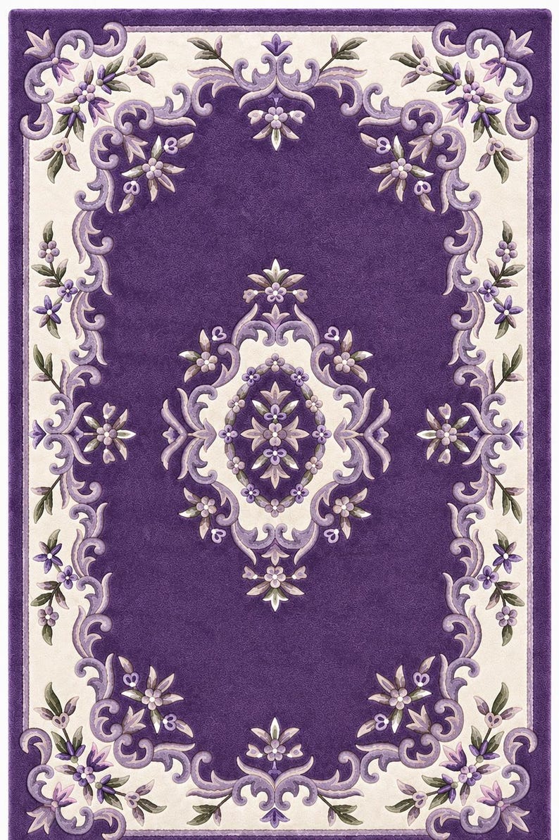 May include: A rectangular area rug featuring a deep purple center with a central cream-colored medallion. The border displays intricate scrolling floral patterns in shades of purple, lavender, and green against a cream background.