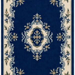 May include: A rectangular area rug featuring a deep blue center field with a central cream-colored medallion. The border is cream with blue scrolling acanthus leaves and floral motifs in shades of blue, green, and tan throughout the design.