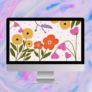 May include: A desktop computer with a floral wallpaper design. The wallpaper features orange, yellow, and pink flowers with green leaves and a purple caterpillar. The background is a light pink color with small blue dots.