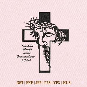 May include: Black embroidered design of a cross with a face and crown of thorns. The text reads "Wonderful, Merciful, Saviour, Precious redeemer & Friend". The image is on a light pink background.