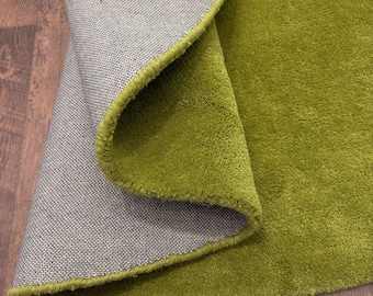 Alfombra de lana tejida a mano: Alfombra moderna de color verde musgo liso para dormitorio.
