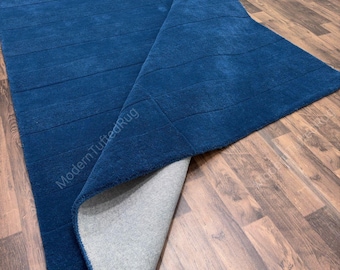 Alfombra de lana tejida a mano: Alfombra moderna de rayas azul oscuro para dormitorio.