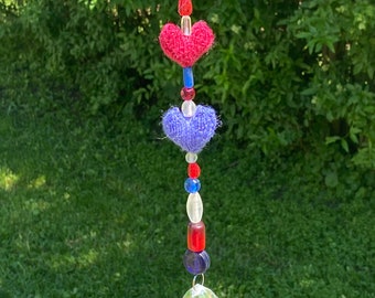 Sparkly Suncatcher with Red and Blue Hand-Knit Hearts and Crystal Prism