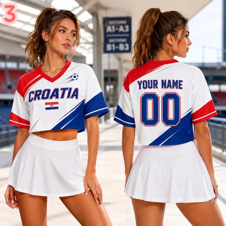 May include: A white, red, and blue cropped jersey featuring the text CROATIA, a soccer ball graphic, and a small Croatian flag on the front, paired with a white pleated skirt. The back displays the text YOUR NAME and the number 00 in blue.