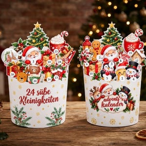 May include: Two white cylindrical advent calendars featuring colorful Christmas illustrations of Santa, snowmen, reindeer, and gifts. The left container displays the text 24 süße Kleinigkeiten, while the right container features the text advents kalender.