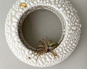 Beaded O-planter with gold accents, made by Golem.