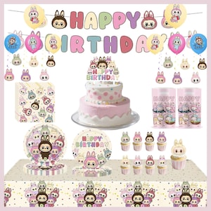 May include: A colourful birthday party set featuring a two-tiered pink cake, cupcakes, plates, cups, and balloons. The decorations have a cartoon bunny theme with the words "HAPPY BIRTHDAY" displayed.