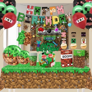 May include: A white ceramic mug with a black handle and the text "But First, Coffee" in a bold, black font. The mug is set against a blurred background, suggesting a cosy setting.