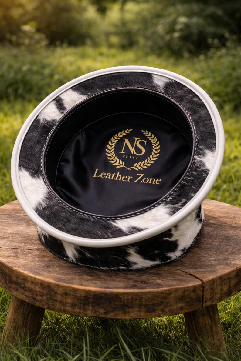 Interior view of handmade cowhide top hat showing soft lining and NS Leather Zone branding
