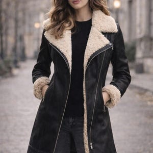 Vintage women’s black shearling coat with faux fur lining, luxury vegan leather long jacket styled for winter street fashion