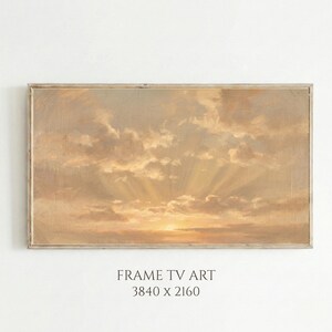 May include: A framed landscape painting depicting a sunset with golden rays of light breaking through the clouds. The artwork is in a rectangular frame and features the text "FRAME TV ART 3840 x 2160".