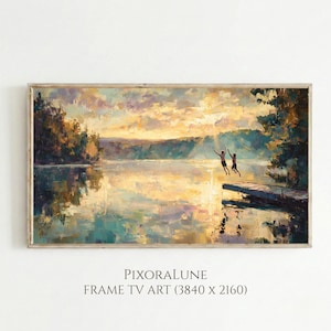 May include: A digital landscape painting titled PIXORALUNE FRAME TV ART (3840 x 2160) depicting two figures jumping off a wooden dock into a lake at sunset. The scene features warm golden light, dark silhouettes of trees, and reflections on the water.