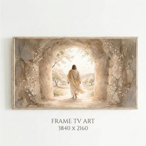 Puede incluir: Una impresión en acuarela enmarcada representa una figura con una túnica fluida caminando hacia una abertura brillante. La escena está ambientada dentro de un arco de piedra, con enredaderas y árboles florecientes. El texto "FRAME TV ART 3840 x 2160" está en la parte inferior.