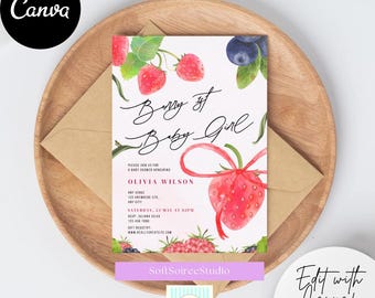 May include: A baby shower invitation with a watercolor berry theme. The invitation features the text "Berry of Baby Girl" in elegant script, along with details for the event. The design includes illustrations of strawberries, blueberries, and raspberries, set on a wooden tray.