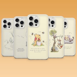 May include: Five phone cases with Winnie the Pooh designs. Each case displays a different image, including Pooh with honey, quotes, and other characters. The cases are off-white with black and yellow graphics.