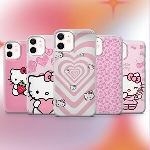 May include: A collection of five pink phone cases featuring Hello Kitty designs. The cases showcase various patterns, including hearts, bows, and the iconic character. The cases are designed to fit a smartphone and offer a cute and stylish aesthetic.