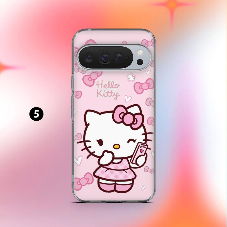 May include: A clear phone case with a pink background featuring a Hello Kitty design. The design includes the Hello Kitty character holding a phone, bows, and the words "Hello Kitty". The case is designed to fit a phone with a camera bar.