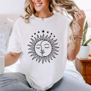 May include: A set of three ceramic mugs with a speckled, matte finish. The mugs are in shades of cream, light gray, and dark gray. Each mug has a simple, minimalist design, perfect for coffee or tea.