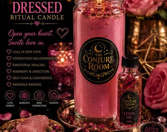 May include: A pink ritual candle in a glass jar with a lit wick, labelled The Conjure Room, accompanied by a 15ml bottle of love oil, a small container of love dust, a pink crystal, and dried rose petals on a gold tray with text.