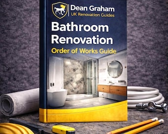 May include: A book titled "Bathroom Renovation" by Dean Graham, with a bathroom interior illustration. The image includes a yellow hard hat, pencils, a stapler, and a rolled blueprint, suggesting a home improvement theme.