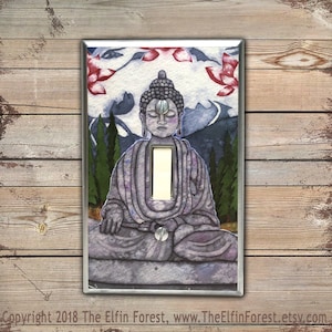 Spiritual Buddah statue light switch plate cover Buddha art room decor for peaceful yoga and meditation vibes.