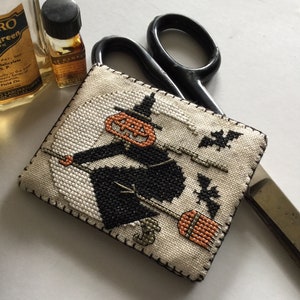 Primitive Halloween cross stitch pattern jack &#39;o lantern, pumpkin head witch flying over a crescent moon. By The Elfin Forest