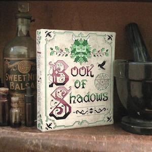 Book of Shadows cross stitch pattern and bookbinding tutorial. DIY craft project. Make your own hand made magic spell book