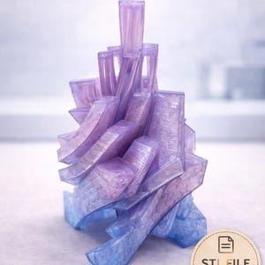 May include: A 3D-printed crystal fidget toy in shades of purple and blue. The design features a complex, layered structure with the text "Crystal Fidget" above. A digital download icon is also present.