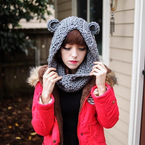 A gray crochet hooded cowl with bear ears on top