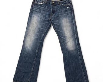 Pantalones vaqueros Hollister boomer de tiro bajo, corte bota ajustado, estilo vintage de los años 2000, con cierre de botones y estilo grunge, talla 35/30.5