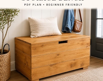 May include: A rectangular wooden storage bench with a natural light brown finish and a horizontal cutout handle on the front panel. The text STORAGE BENCH PDF PLAN BEGINNER FRIENDLY is displayed above the bench, which is topped with a cream-colored rectangular throw pillow.