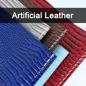 May include: A selection of artificial leather swatches in shades of blue, red, brown, and grey. The material has a textured, crocodile skin effect. The words "Artificial Leather" are displayed in white text.