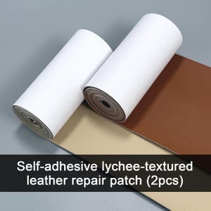 May include: Two rolls of self-adhesive lychee-textured leather repair patch. One roll is a light beige color and the other is a medium brown color. Both rolls feature a white backing paper. The text reads: Self-adhesive lychee-textured leather repair patch (2pcs).
